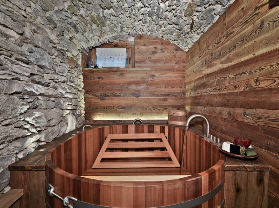 Interiors of a Rustic Bathroom with Stone Walls